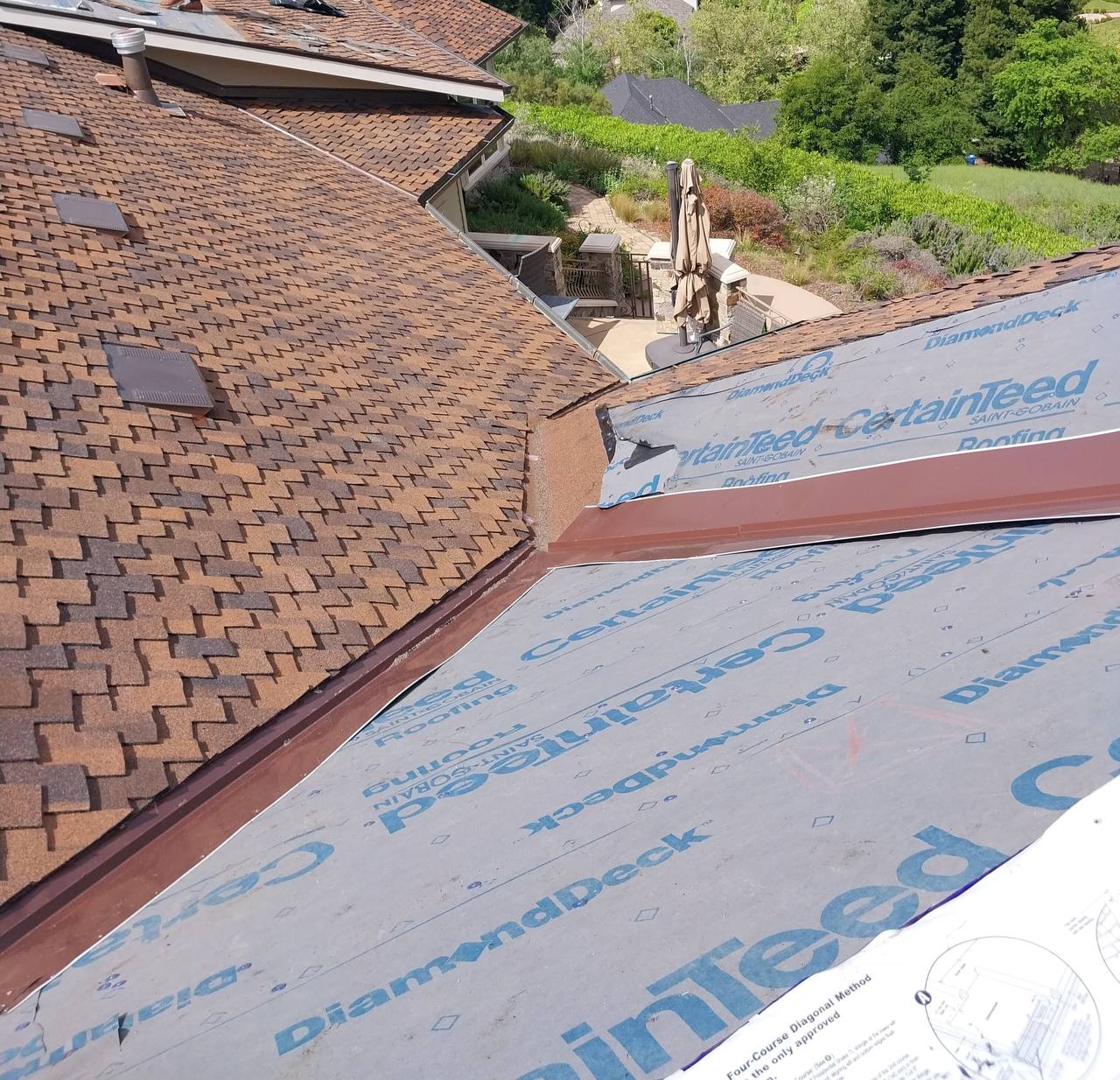 Close-up of CertainTeed DiamondDeck synthetic underlayment meeting finished shingle edge